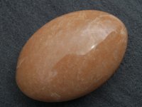 Apricot Feldspar / Moonstone: palmstone (Madagascar)