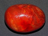 Carnelian: polished pebble (Madagascar)