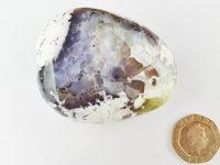 Merlinite: polished pebble
