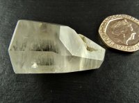 Clear Quartz: polished point - Silver Included