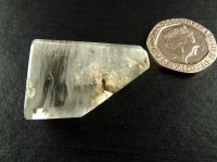 Clear Quartz: polished point - Silver Included
