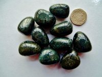 Galaxyite: tumbled stones